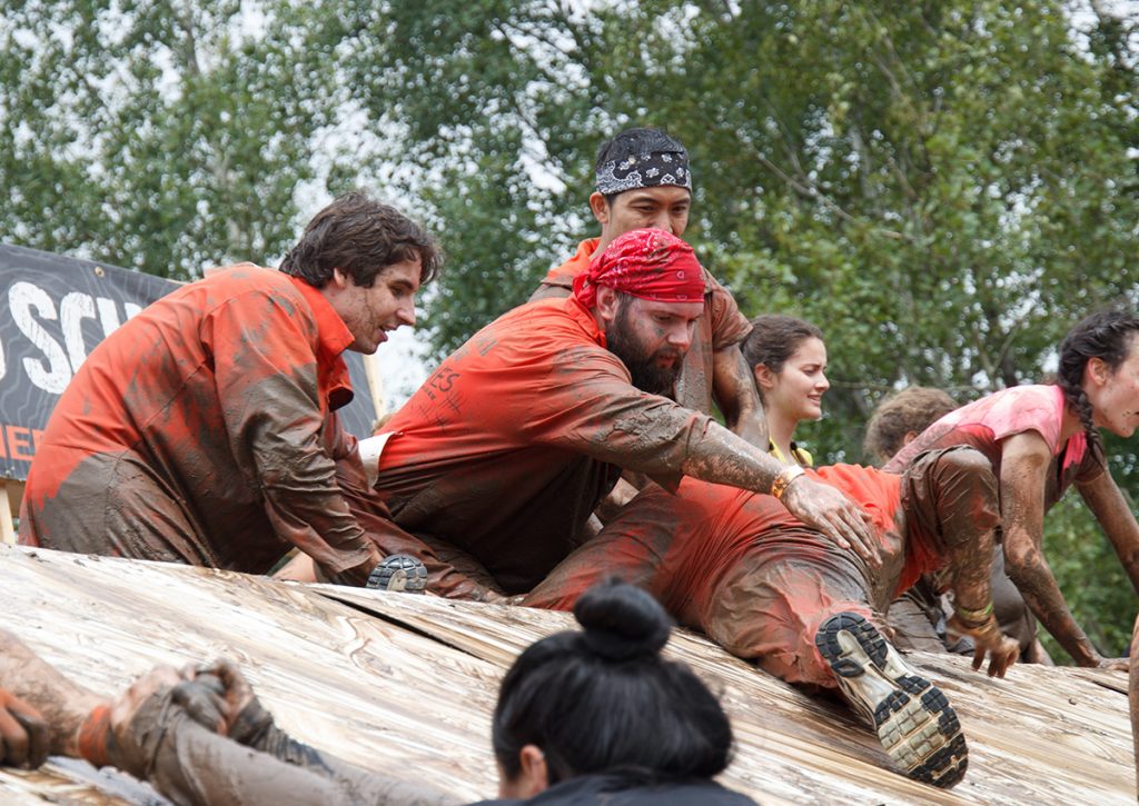 Eric lending a hand to other Tough Mudders